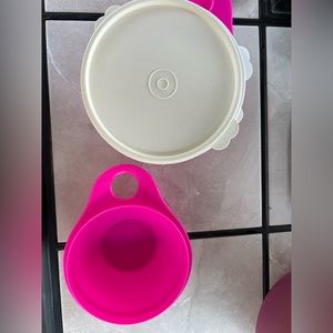 Tupperware pink bowls with lids
